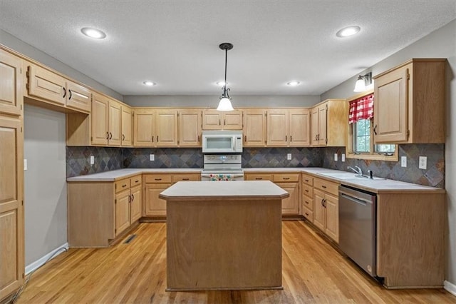 701 NE Hunters Cir, Blue Springs, MO 64014 - kitchen with white appliances, light brown cabinets, and light wood-style floors