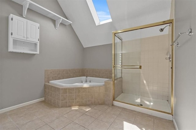 701 NE Hunters Cir, Blue Springs, MO 64014 - bathroom with a skylight, a garden tub, tile patterned flooring, a shower stall, and vaulted ceiling
