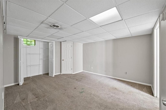 701 NE Hunters Cir, Blue Springs, MO 64014 - unfurnished bedroom featuring carpet flooring and a paneled ceiling