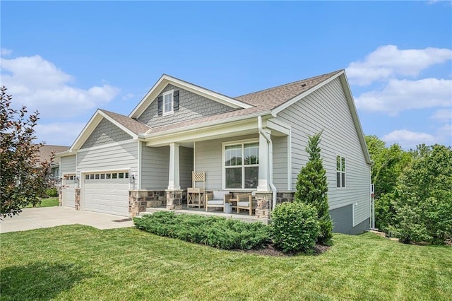 24842 W 144th St, Olathe, KS 66061 - craftsman-style house featuring a porch, concrete driveway, a front yard, an attached garage, and stone siding