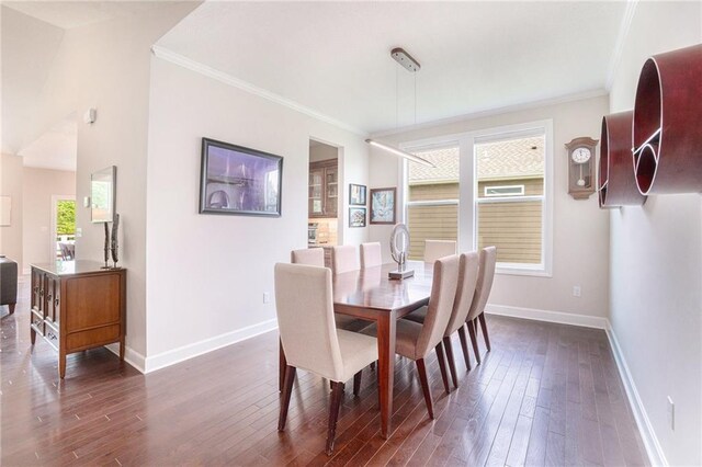 24842 W 144th St, Olathe, KS 66061 - dining area with dark wood finished floors and ornamental molding