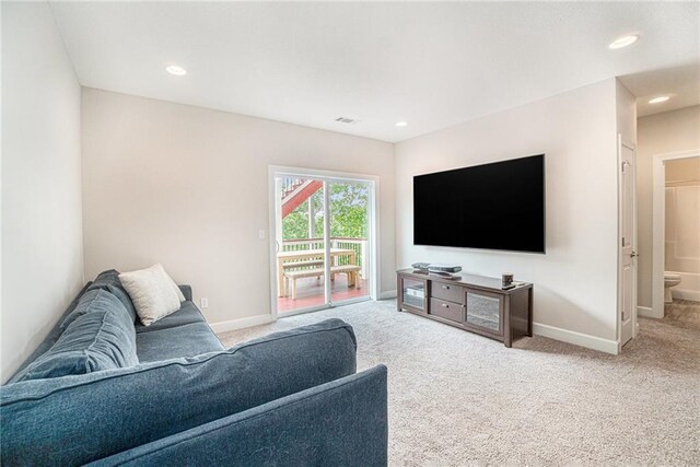 24842 W 144th St, Olathe, KS 66061 - carpeted living room featuring baseboards and recessed lighting