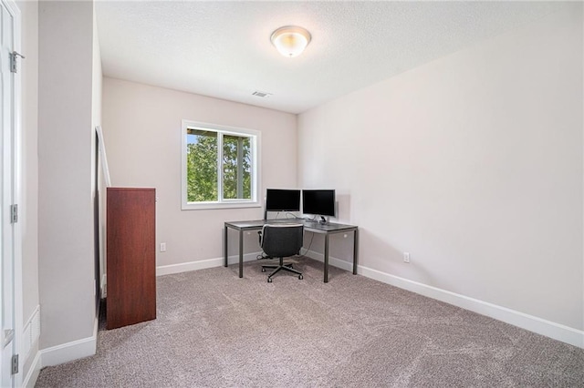 24842 W 144th St, Olathe, KS 66061 - carpeted home office with baseboards and a textured ceiling