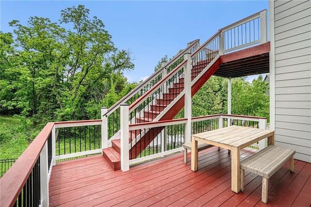 24842 W 144th St, Olathe, KS 66061 - wooden deck with stairway and outdoor dining area