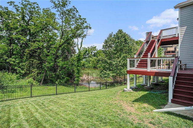 24842 W 144th St, Olathe, KS 66061 - view of yard featuring stairway and a wooden deck