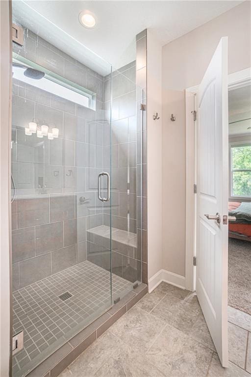24842 W 144th St, Olathe, KS 66061 - ensuite bathroom featuring a stall shower, baseboards, and recessed lighting