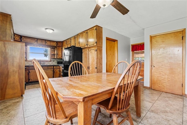 31882 W 180th St, Lawson, MO 64062 - dining area with a ceiling fan, plenty of natural light, and light tile patterned floors
