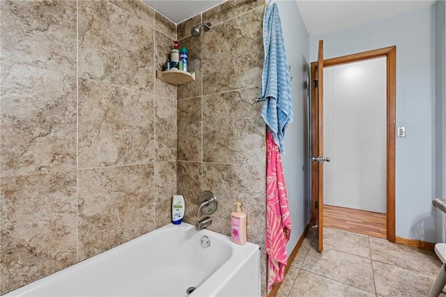 31882 W 180th St, Lawson, MO 64062 - bathroom featuring shower / bath combination with curtain, tile patterned floors, and baseboards