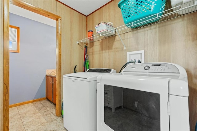 31882 W 180th St, Lawson, MO 64062 - laundry room featuring separate washer and dryer and wooden walls