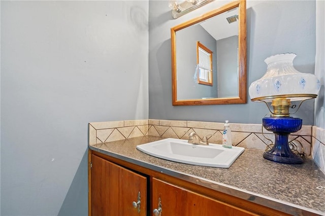 31882 W 180th St, Lawson, MO 64062 - bathroom with vanity and decorative backsplash
