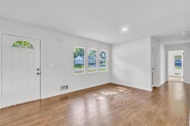12926 Virginia Ave, Kansas City, MO 64146 - foyer entrance featuring plenty of natural light, wood finished floors, baseboards, and recessed lighting