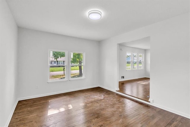 12926 Virginia Ave, Kansas City, MO 64146 - unfurnished room with wood finished floors and baseboards
