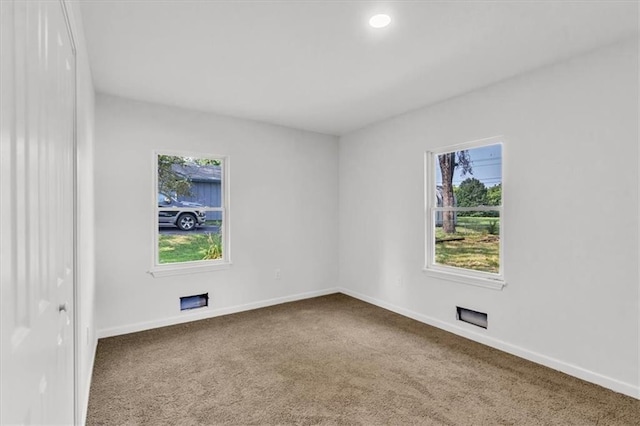 12926 Virginia Ave, Kansas City, MO 64146 - carpeted spare room featuring baseboards and recessed lighting