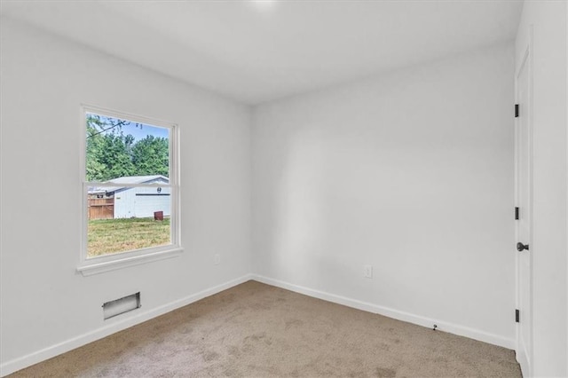 12926 Virginia Ave, Kansas City, MO 64146 - unfurnished room featuring carpet and baseboards