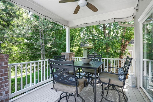 6522 W 133rd Ter, Leawood, KS 66209 - wooden deck featuring a ceiling fan and outdoor dining area