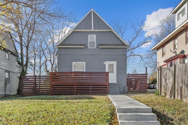 3332 Flora Ave, Kansas City, MO 64109 - view of front of house featuring roof with shingles