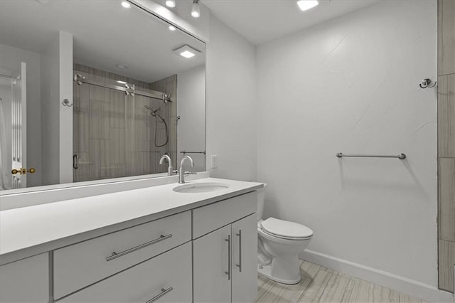 9100 Lamar Ave Unit 107, Overland Park, KS 66207 - full bathroom featuring vanity and a shower with shower door