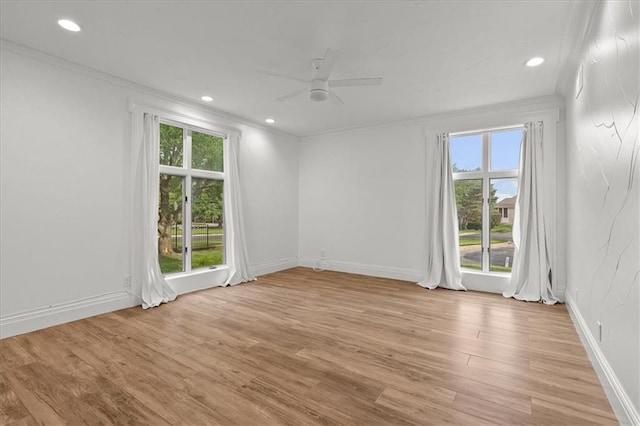9100 Lamar Ave Unit 107, Overland Park, KS 66207 - spare room with plenty of natural light, crown molding, a ceiling fan, light wood finished floors, and recessed lighting