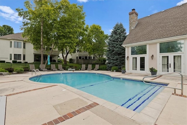9100 Lamar Ave Unit 107, Overland Park, KS 66207 - community pool featuring french doors and a patio