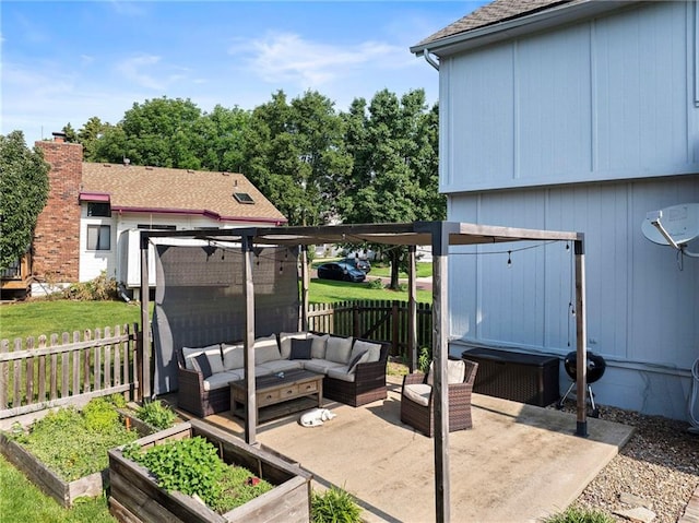 5901 W 158th St, Overland Park, KS 66223 - fenced backyard featuring outdoor lounge area, a vegetable garden, and a patio area