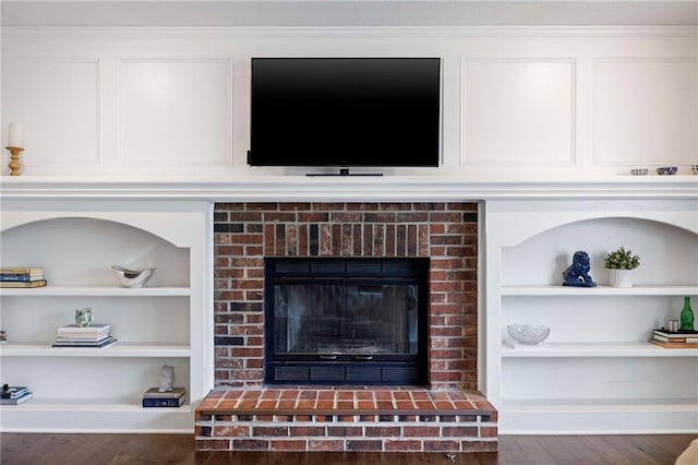 5901 W 158th St, Overland Park, KS 66223 - detailed view of wood finished floors, a fireplace, and built in shelves