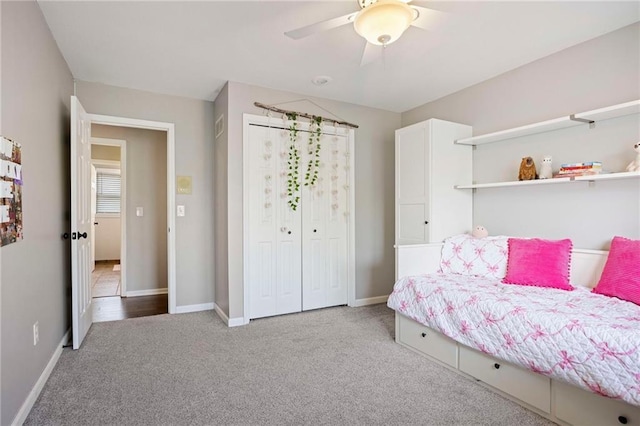 5901 W 158th St, Overland Park, KS 66223 - carpeted bedroom featuring ceiling fan, baseboards, and a closet