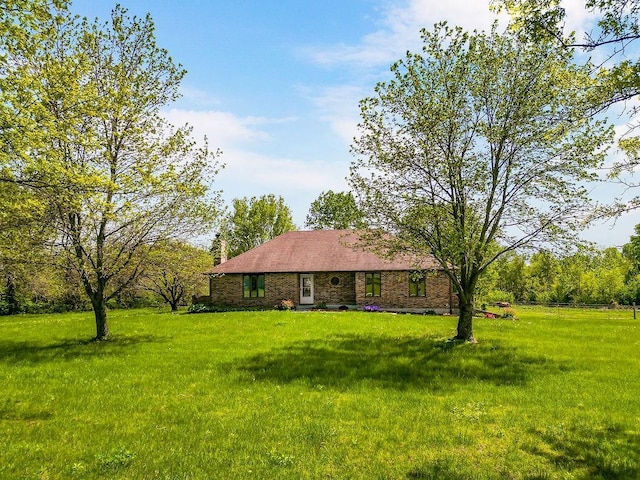 34701 E 235th St, Pleasant Hill, MO 64080 - view of front of home with a front lawn and brick siding