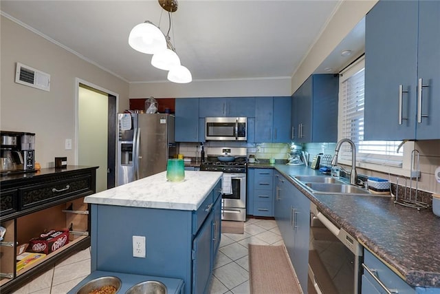 822 S Noland Rd, Independence, MO 64050 - kitchen with blue cabinetry, stainless steel appliances, a sink, decorative backsplash, and ornamental molding