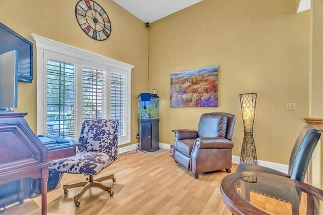 8506 W 155th Pl, Overland Park, KS 66223 - home office with light wood-style flooring, baseboards, and a high ceiling