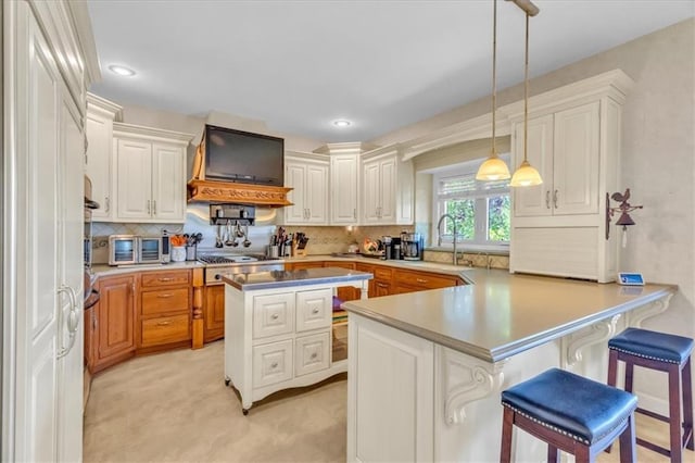 8506 W 155th Pl, Overland Park, KS 66223 - kitchen featuring custom exhaust hood, light carpet, a peninsula, backsplash, and hanging light fixtures