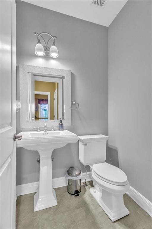8506 W 155th Pl, Overland Park, KS 66223 - half bathroom with toilet and baseboards