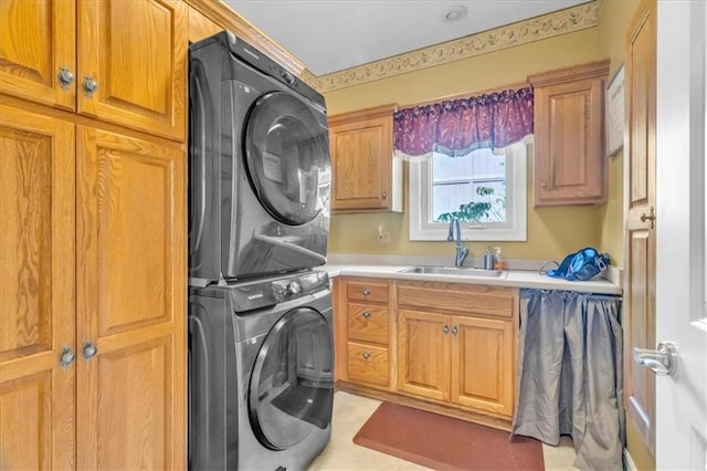 8506 W 155th Pl, Overland Park, KS 66223 - washroom with stacked washer and clothes dryer and cabinet space