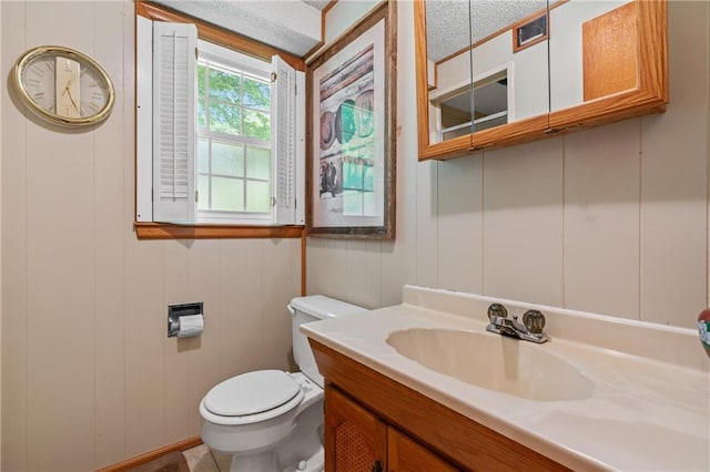 5201 Noland Rd, Kansas City, MO 64133 - bathroom with vanity and a decorative wall