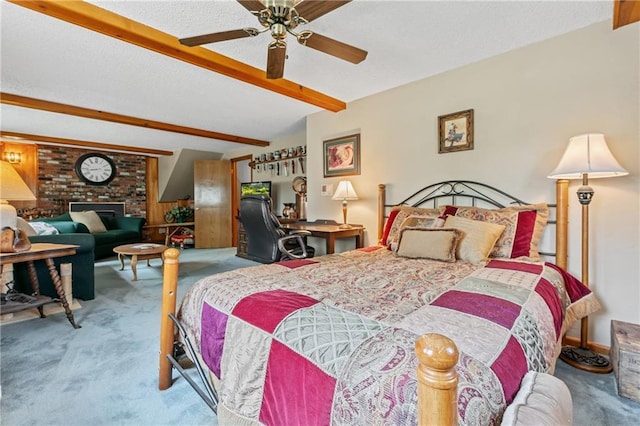 5201 Noland Rd, Kansas City, MO 64133 - carpeted bedroom with beam ceiling and a fireplace