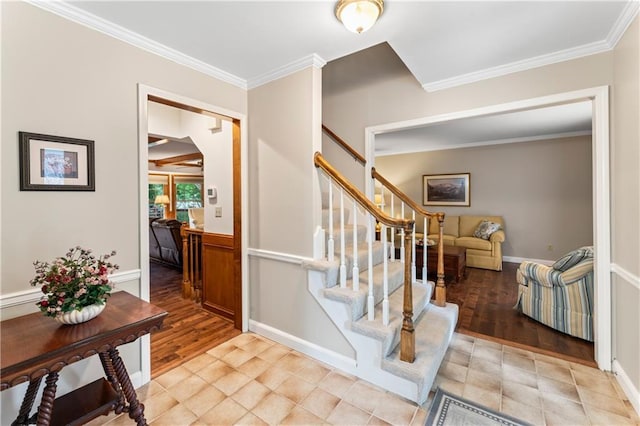 16362 W Briarwood Ct, Olathe, KS 66062 - entrance foyer with crown molding, light wood-style floors, and stairs