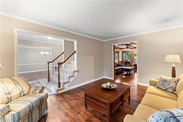 16362 W Briarwood Ct, Olathe, KS 66062 - living area with wood finished floors, a chandelier, stairway, crown molding, and ceiling fan
