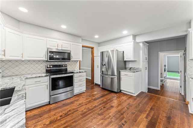 16362 W Briarwood Ct, Olathe, KS 66062 - kitchen featuring stainless steel appliances, white cabinetry, backsplash, and recessed lighting