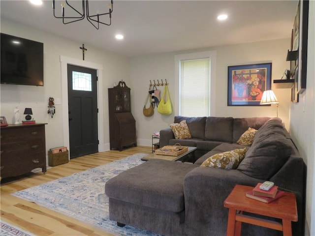 205 W Wea St, Paola, KS 66071 - living area featuring a chandelier, light wood finished floors, and recessed lighting