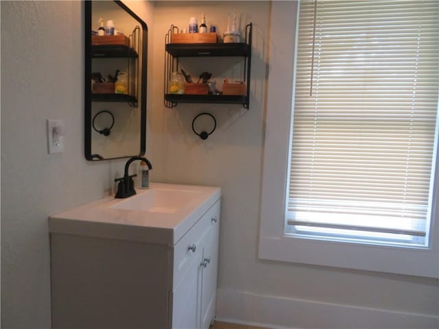 205 W Wea St, Paola, KS 66071 - bathroom featuring vanity