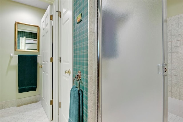 11814 W 149th St, Olathe, KS 66062 - bathroom featuring a shower stall and tile patterned floors