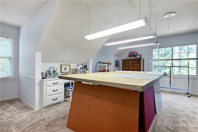 11814 W 149th St, Olathe, KS 66062 - kitchen with light colored carpet, a textured ceiling, butcher block counters, healthy amount of natural light, and vaulted ceiling