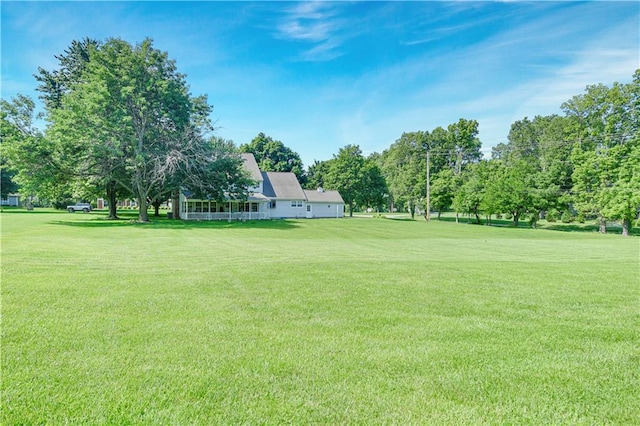 11814 W 149th St, Olathe, KS 66062 - view of grassy yard with view of scattered trees