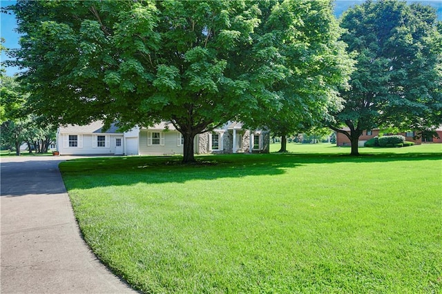 11814 W 149th St, Olathe, KS 66062 - view of front of home with a front lawn and driveway