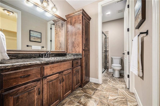 4512 NE Parks Summit Ter, Lees Summit, MO 64064 - full bath featuring a shower stall, vanity, and stone finish floors