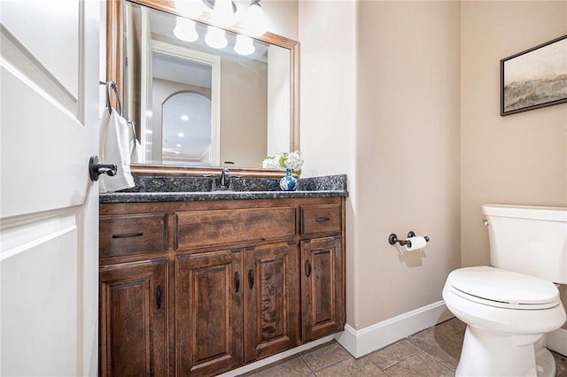 4512 NE Parks Summit Ter, Lees Summit, MO 64064 - half bathroom with vanity and tile patterned flooring