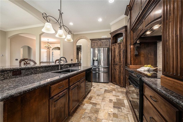 4512 NE Parks Summit Ter, Lees Summit, MO 64064 - kitchen with black appliances, arched walkways, dark brown cabinetry, dark stone counters, and ornamental molding