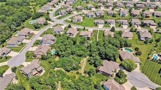4512 NE Parks Summit Ter, Lees Summit, MO 64064 - aerial view of property and surrounding area featuring nearby suburban area