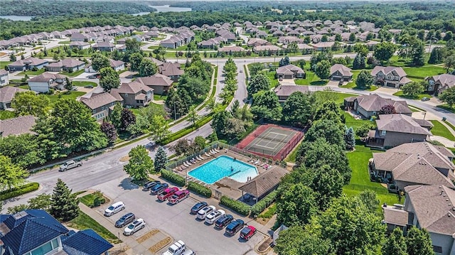 4512 NE Parks Summit Ter, Lees Summit, MO 64064 - aerial perspective of suburban area with a pool