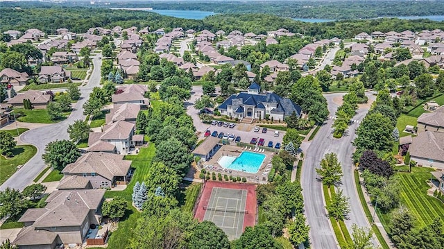 4512 NE Parks Summit Ter, Lees Summit, MO 64064 - aerial view of property and surrounding area with nearby suburban area