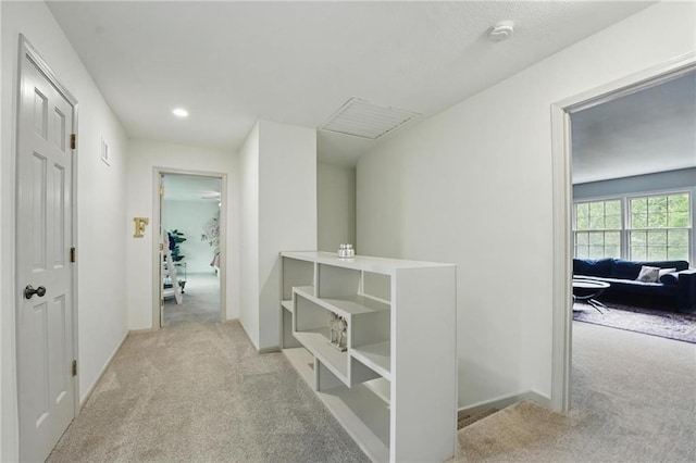 3632 NW Blue Jacket Dr, Lees Summit, MO 64064 - hall with light colored carpet, baseboards, and recessed lighting